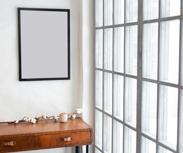 A calm and spacious studio interior with soft lighting and minimalist design elements.